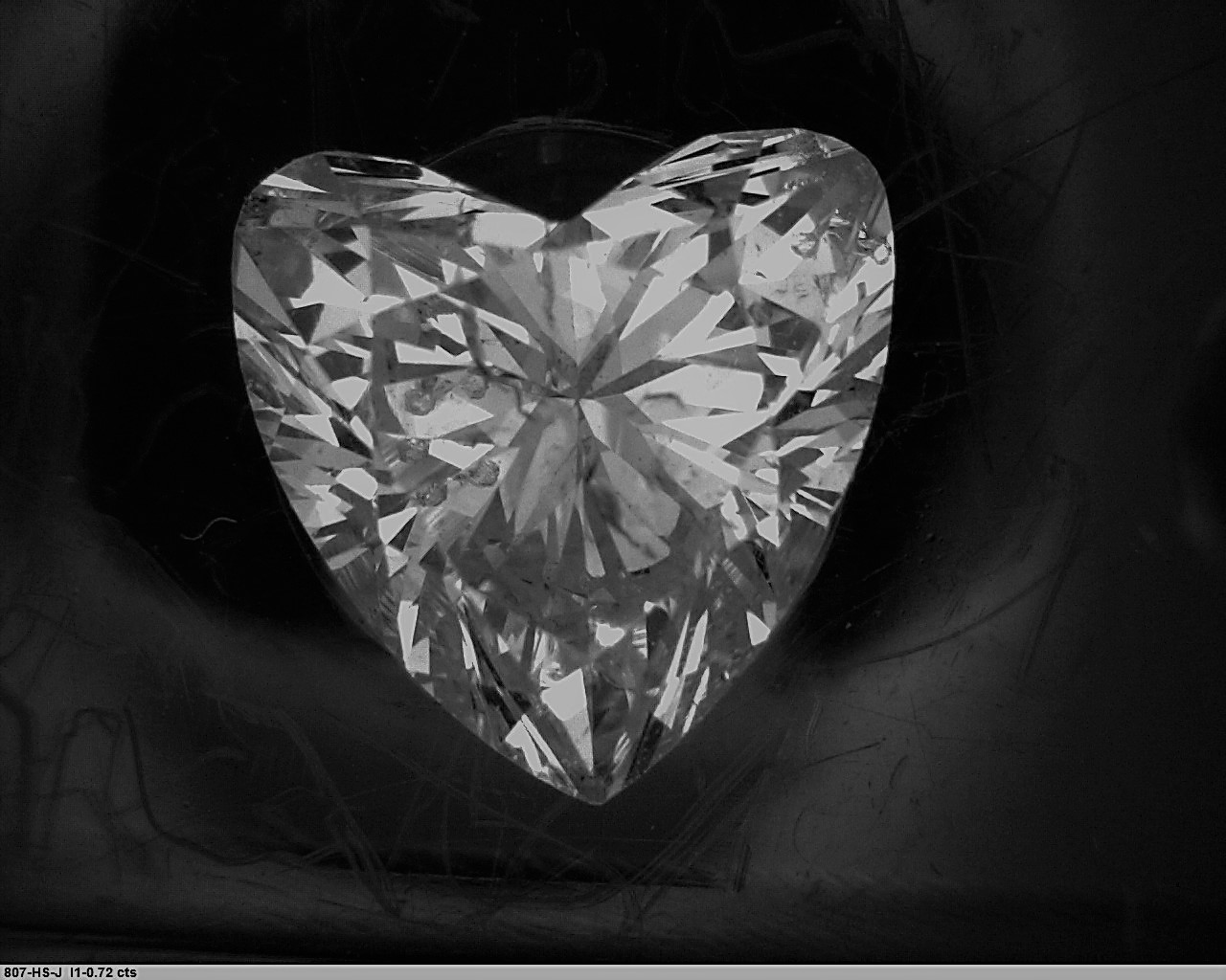 0.72 Carat Heart J I1 GIA Diamond